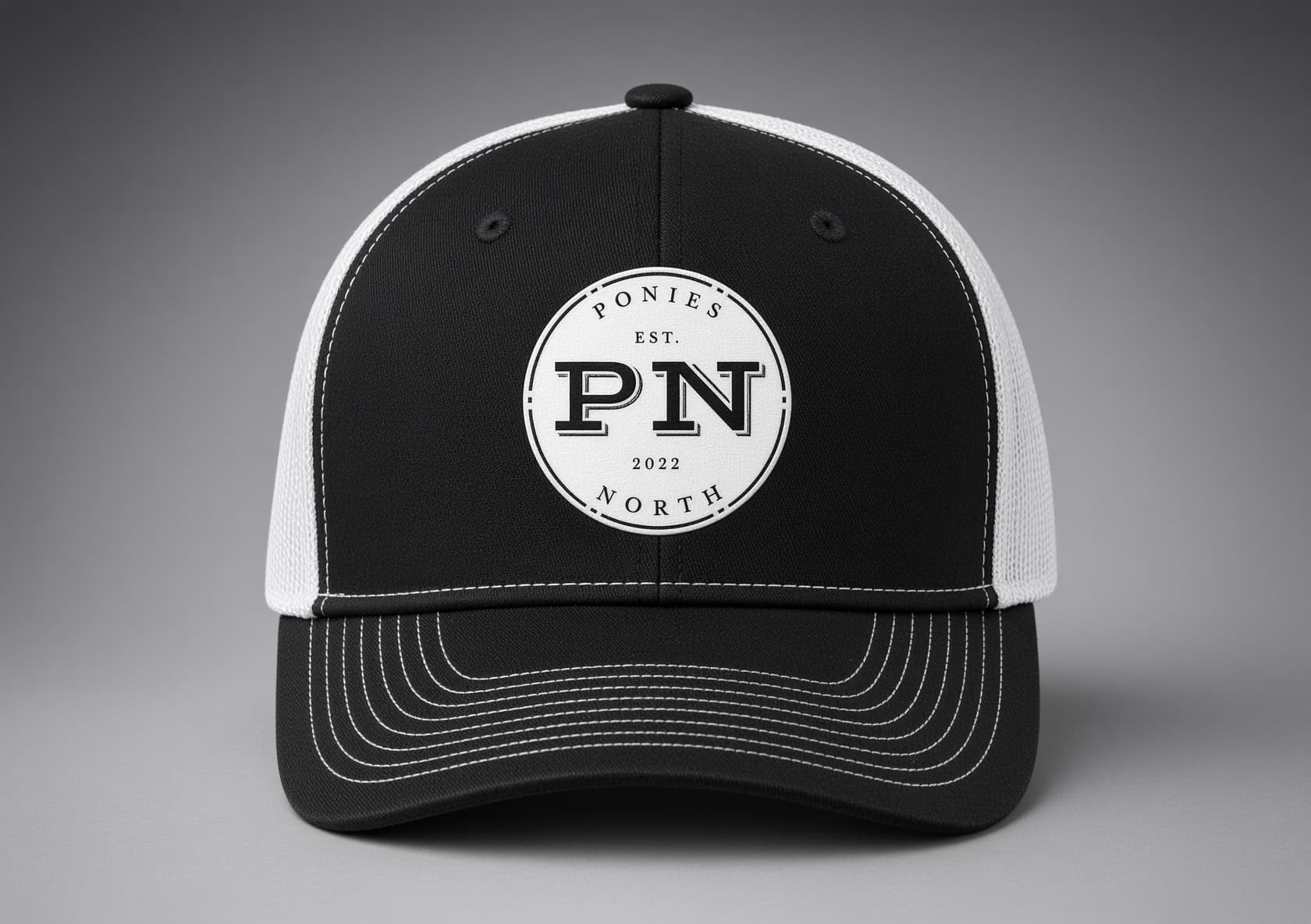 Black and white Ponies North trucker hat